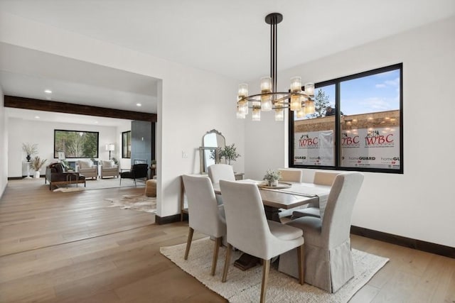 1942 Whitefish Ave, Whitefish, MT 59937 - dining room with a chandelier, wood finished floors, and recessed lighting