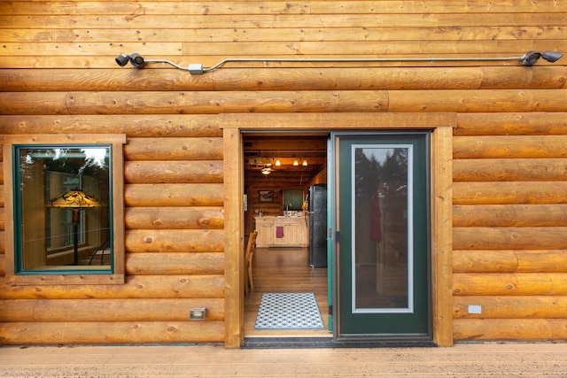 589 Summit Dr, Seeley Lake, MT 59868 - property entrance with log veneer siding