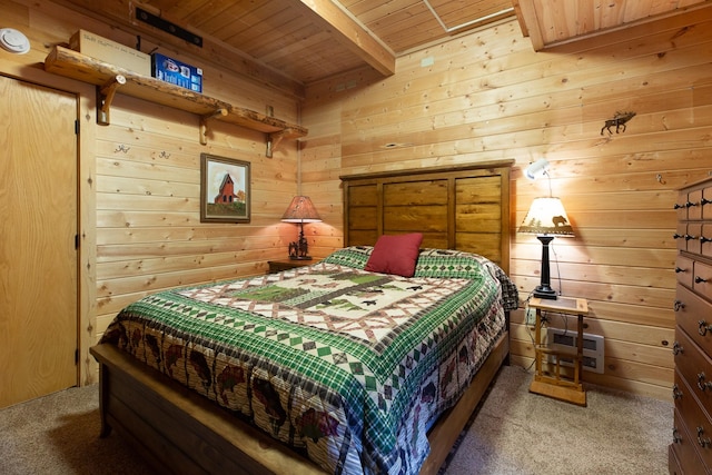 589 Summit Dr, Seeley Lake, MT 59868 - carpeted bedroom with a wooden ceiling with exposed beams and wooden walls