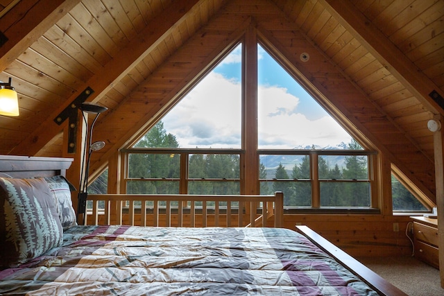 589 Summit Dr, Seeley Lake, MT 59868 - carpeted bedroom with wooden ceiling and wood walls
