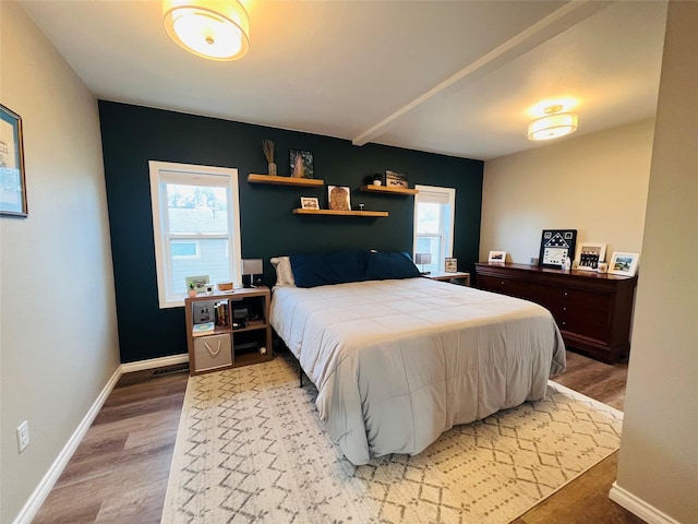 502 Illinois Ave, Valier, MT 59486 - bedroom with light wood-style flooring and baseboards