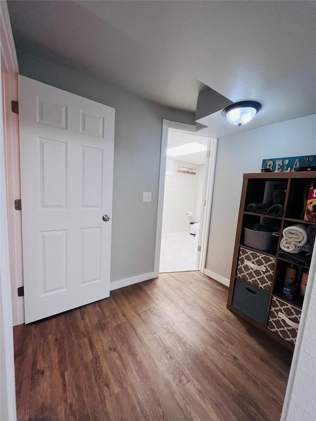 502 Illinois Ave, Valier, MT 59486 - hall featuring wood finished floors and baseboards