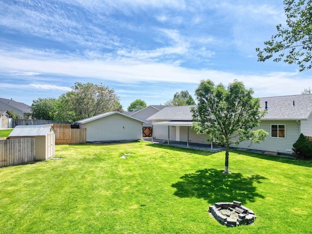 144 Beargrass Ln, Kalispell, MT 59901 - view of yard featuring an outdoor fire pit