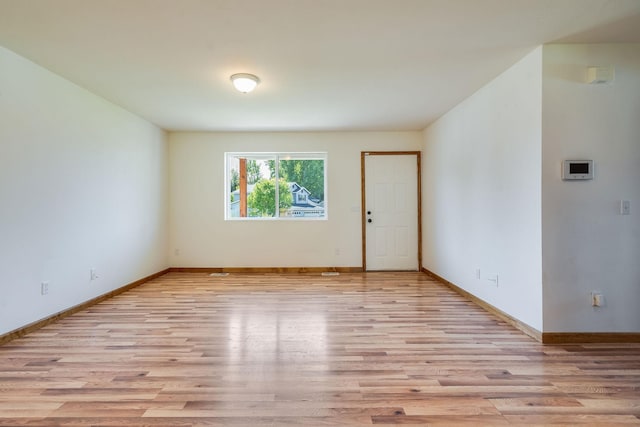 144 Beargrass Ln, Kalispell, MT 59901 - unfurnished room featuring light wood-type flooring and baseboards