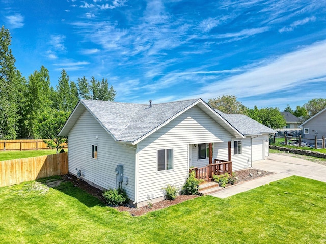 144 Beargrass Ln, Kalispell, MT 59901 - view of front of home with roof with shingles and driveway