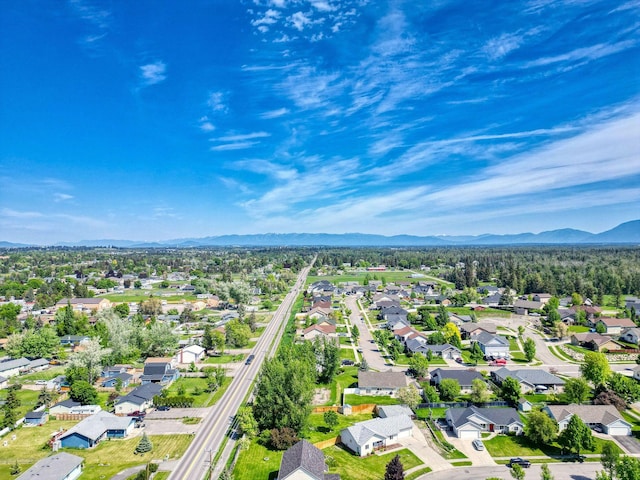 144 Beargrass Ln, Kalispell, MT 59901 - aerial perspective of suburban area featuring mountains