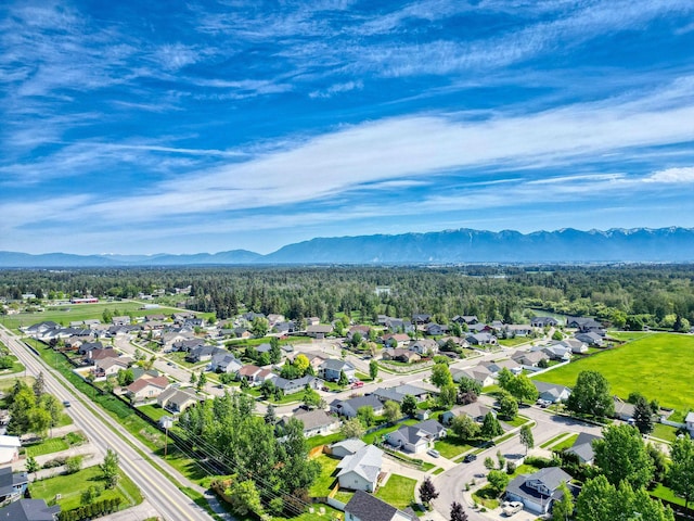 144 Beargrass Ln, Kalispell, MT 59901 - aerial perspective of suburban area with a mountainous background