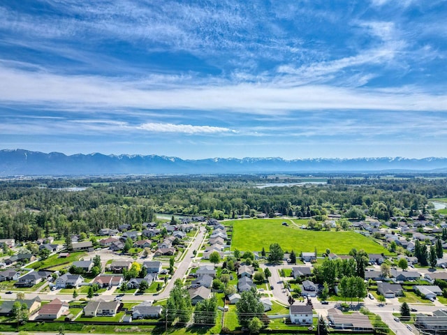 144 Beargrass Ln, Kalispell, MT 59901 - aerial view of residential area featuring a mountain backdrop