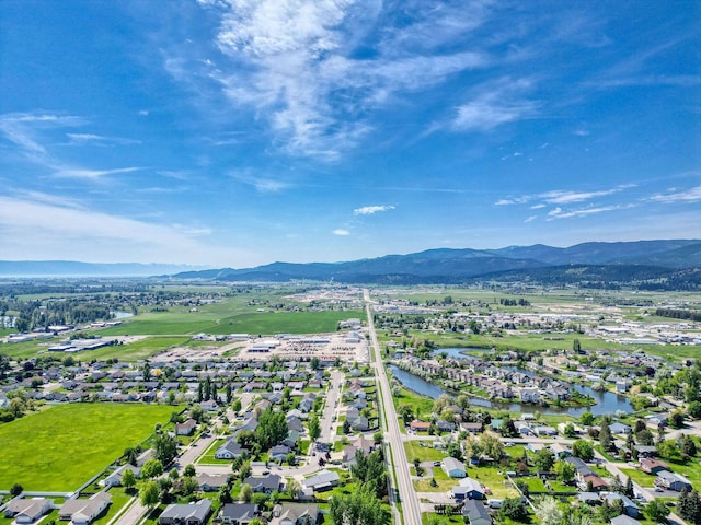 144 Beargrass Ln, Kalispell, MT 59901 - aerial perspective of suburban area featuring a water and mountain view