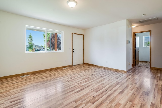144 Beargrass Ln, Kalispell, MT 59901 - unfurnished room featuring light wood-style flooring and baseboards
