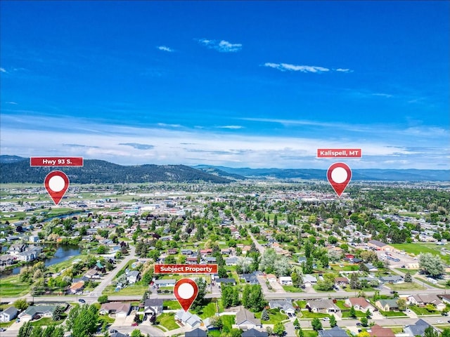 144 Beargrass Ln, Kalispell, MT 59901 - view of property location featuring mountains and nearby suburban area