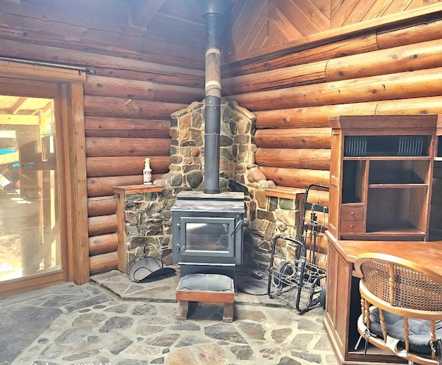 438 Little Mill Creek Rd, Saint Regis, MT 59866 - detailed view of a wood stove and rustic walls