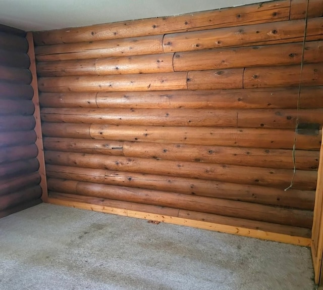 438 Little Mill Creek Rd, Saint Regis, MT 59866 - carpeted empty room featuring log walls