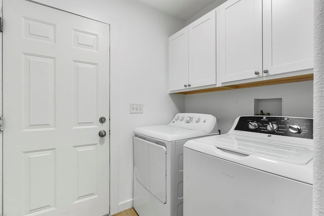 1337A Lily Ct, Missoula, MT 59802 - washroom featuring cabinet space and washing machine and clothes dryer