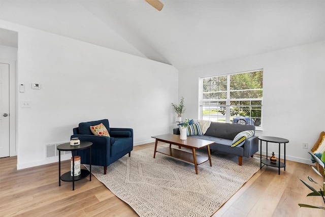1337A Lily Ct, Missoula, MT 59802 - living room featuring light wood-type flooring, baseboards, and high vaulted ceiling