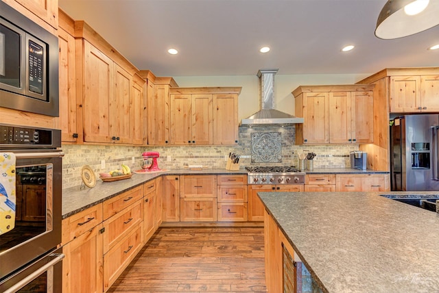 20 Penny Ln, Clancy, MT 59634 - kitchen featuring stainless steel appliances, wall chimney exhaust hood, light brown cabinets, wood finished floors, and recessed lighting