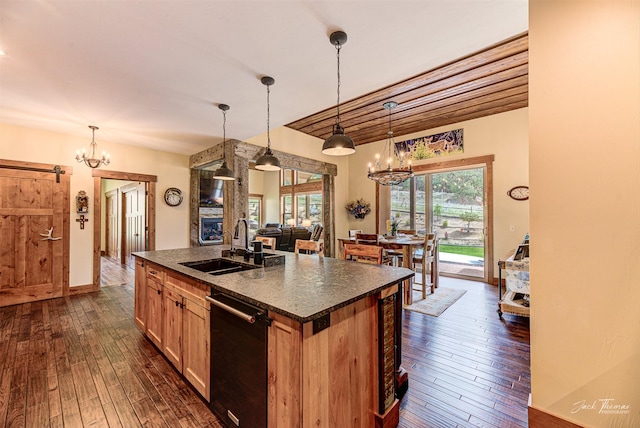 20 Penny Ln, Clancy, MT 59634 - kitchen featuring a chandelier, dishwasher, dark countertops, and dark wood-type flooring