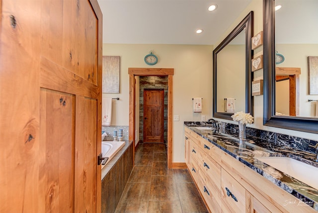 20 Penny Ln, Clancy, MT 59634 - full bathroom with double vanity, a garden tub, and recessed lighting