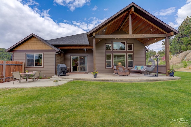 20 Penny Ln, Clancy, MT 59634 - back of house with an outdoor hangout area, a patio area, and roof with shingles