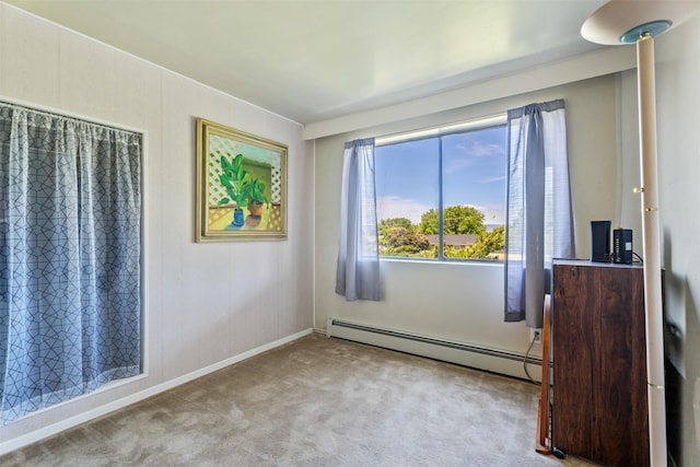 2404 56th St, Missoula, MT 59803 - carpeted spare room featuring baseboard heating and baseboards