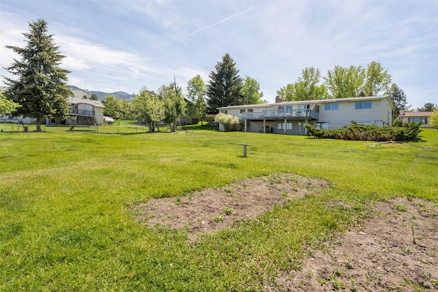 2404 56th St, Missoula, MT 59803 - view of grassy yard with a deck