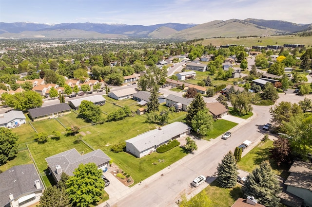 2404 56th St, Missoula, MT 59803 - aerial perspective of suburban area featuring a mountain backdrop
