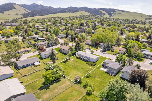 2404 56th St, Missoula, MT 59803 - aerial view of residential area featuring a mountainous background and property boundaries highlighted
