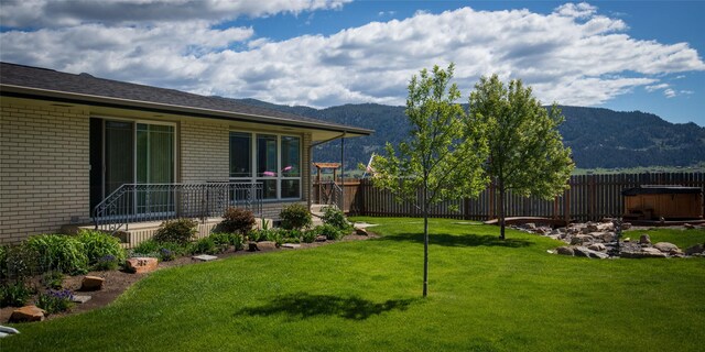345 Ash Dr, Butte, MT 59701 - view of grassy yard with a patio area