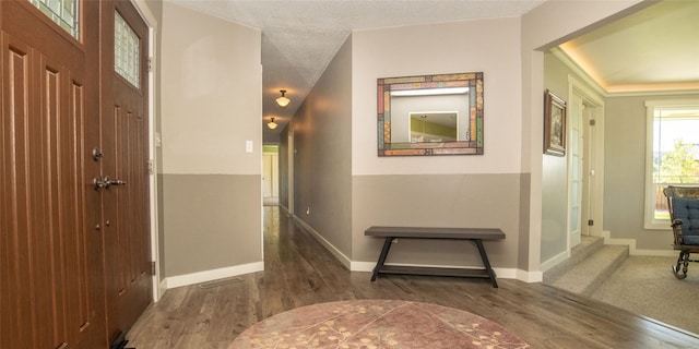 345 Ash Dr, Butte, MT 59701 - foyer entrance with wood finished floors and baseboards