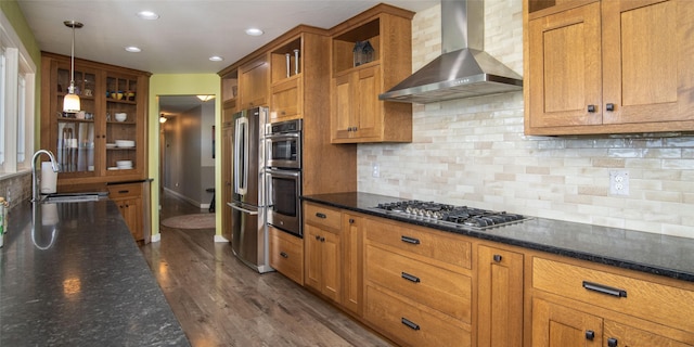 345 Ash Dr, Butte, MT 59701 - kitchen with wall chimney exhaust hood, stainless steel appliances, a sink, brown cabinetry, and open shelves