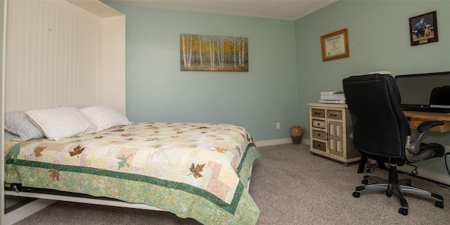 345 Ash Dr, Butte, MT 59701 - bedroom with carpet, a desk, and baseboards