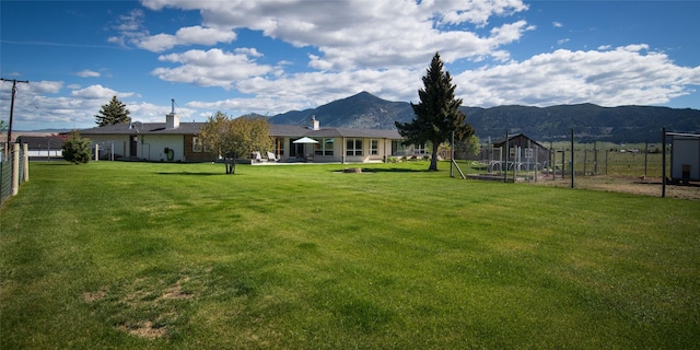 345 Ash Dr, Butte, MT 59701 - view of yard with a mountain view and a vegetable garden