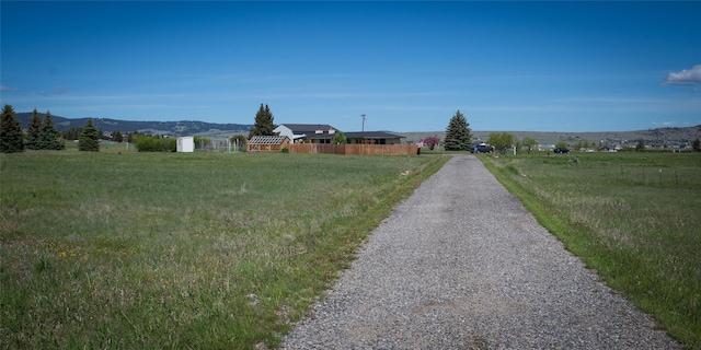 345 Ash Dr, Butte, MT 59701 - view of dirt / gravel road featuring a view of countryside and a mountain view