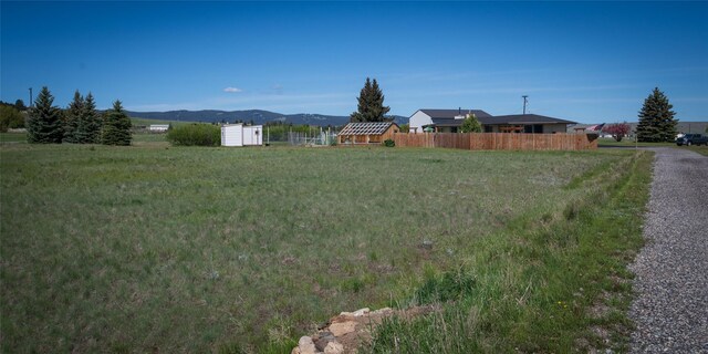 345 Ash Dr, Butte, MT 59701 - view of dirt / gravel road featuring a view of countryside and a mountain view