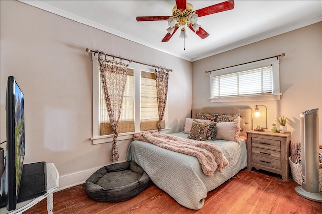 1712 1st Ave N, Great Falls, MT 59401 - bedroom with hardwood / wood-style flooring, crown molding, a ceiling fan, and baseboards