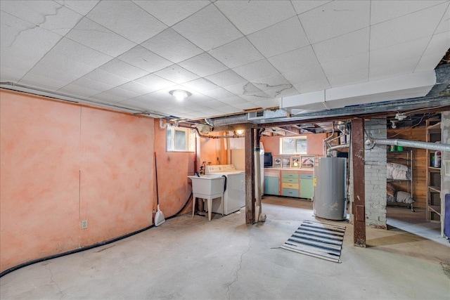1712 1st Ave N, Great Falls, MT 59401 - below grade area featuring water heater, plenty of natural light, and a sink