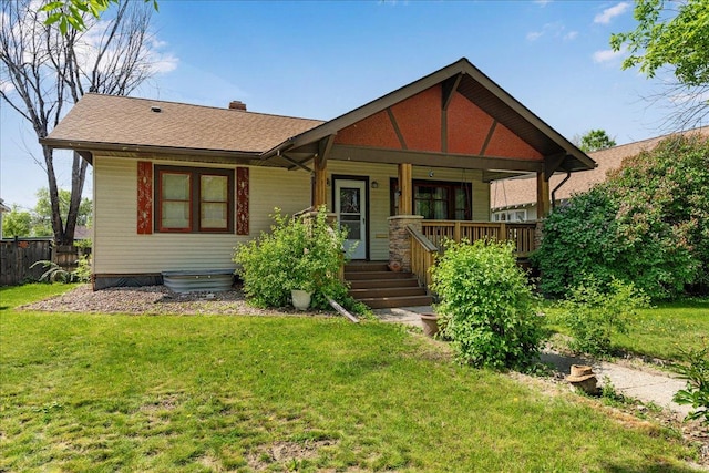1712 1st Ave N, Great Falls, MT 59401 - view of front of house featuring covered porch and roof with shingles