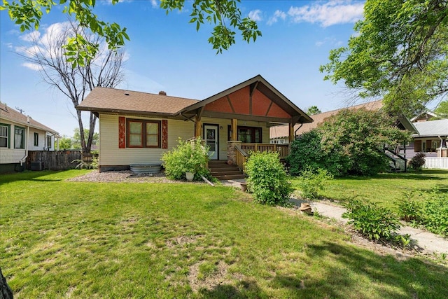 1712 1st Ave N, Great Falls, MT 59401 - back of house featuring a porch and central AC unit
