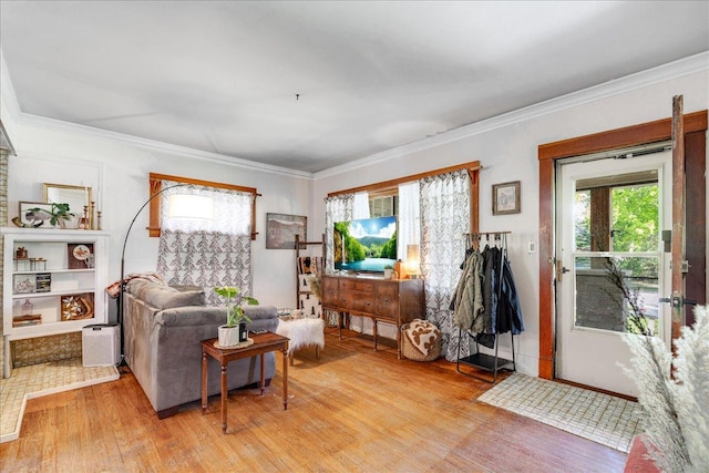 1712 1st Ave N, Great Falls, MT 59401 - living room featuring light wood-style floors, plenty of natural light, and crown molding