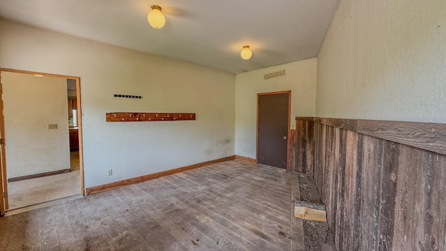 6180 Elkhorn Rd, Helena, MT 59602 - spare room featuring wood finished floors