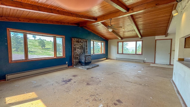 6180 Elkhorn Rd, Helena, MT 59602 - unfurnished living room featuring a baseboard heating unit, a wood stove, ceiling fan, and wooden ceiling