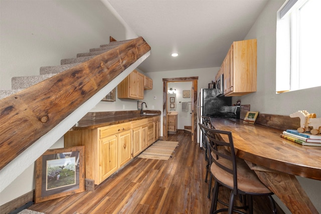 300 Morning View Dr, Kalispell, MT 59901 - kitchen with a sink, dark wood-type flooring, light brown cabinetry, wood counters, and recessed lighting
