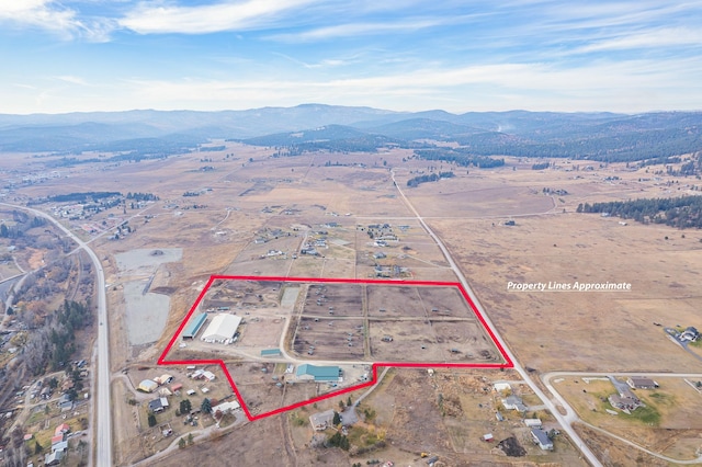 300 Morning View Dr, Kalispell, MT 59901 - aerial view of property's location with a mountainous background and property boundaries highlighted
