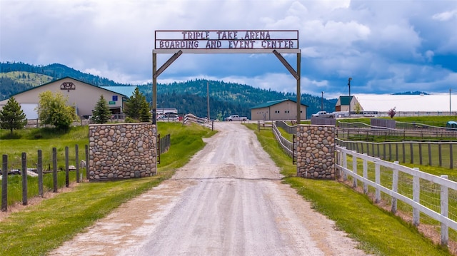 300 Morning View Dr, Kalispell, MT 59901 - view of dirt / gravel road with a mountain view and a gated entry