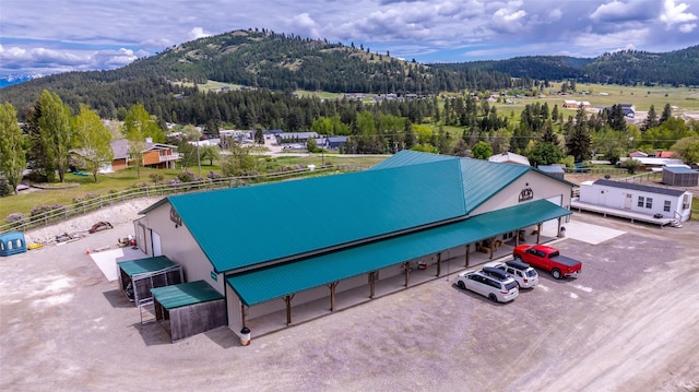 300 Morning View Dr, Kalispell, MT 59901 - drone / aerial view of a mountainous background and a forest