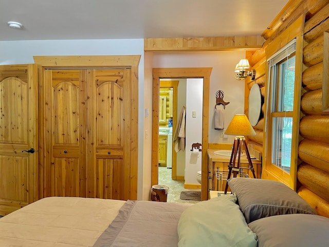30 Williams Gulch Loop, Philipsburg, MT 59858 - bedroom with rustic walls and a chandelier