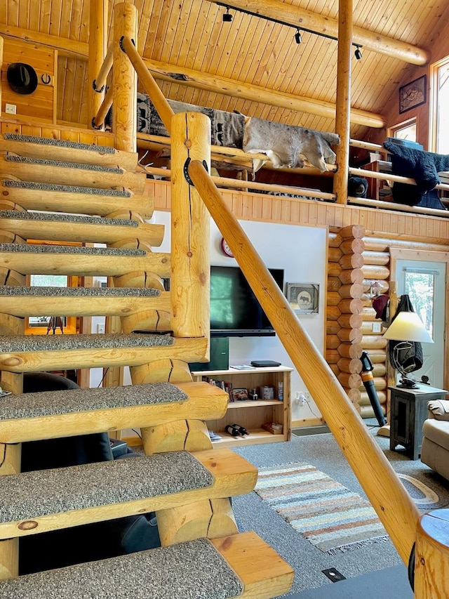 30 Williams Gulch Loop, Philipsburg, MT 59858 - stairway with a wooden ceiling with exposed beams, rustic walls, plenty of natural light, and a towering ceiling