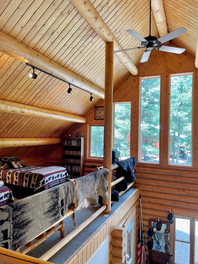 30 Williams Gulch Loop, Philipsburg, MT 59858 - bedroom featuring wood ceiling, rustic walls, and rail lighting