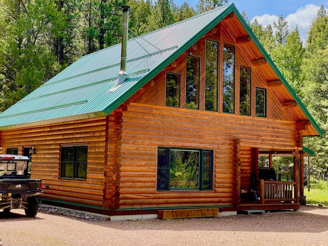 30 Williams Gulch Loop, Philipsburg, MT 59858 - view of side of property featuring log siding and a metal roof