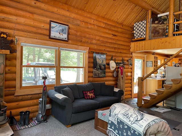 30 Williams Gulch Loop, Philipsburg, MT 59858 - living room with healthy amount of natural light, carpet, stairway, wood ceiling, and log walls